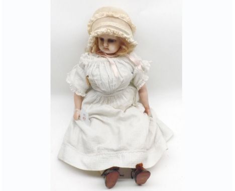 Cuno and Otto Dressel dipped wax head and shoulder plate Doll, fixed brown glass eyes, painted lips, (cracking to face and ne