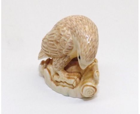 Japanese Ivory Netsuke, carved in the form of perched Eagle, base signed, 1" high
&nbsp;
Condition:
Some minor surface marks,