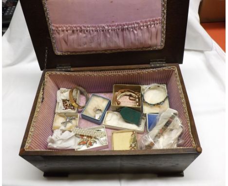 Early 20th Century Oak jewellery box containing a range of various costume jewellery items to include expandable bracelets, b