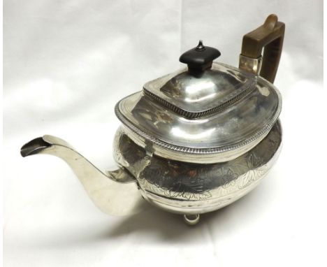 A George III Silver Teapot, of compressed oval form, with banded foliate and floral engraving, gadrooned rim, replacement tre