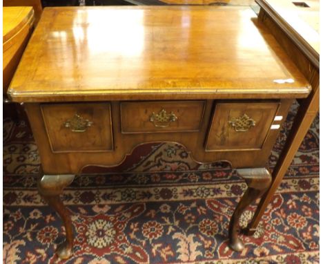 18th Century Walnut veneered Low Boy, the body with three drawers, replacement brass handles, raised on cabriole legs, 37 wid