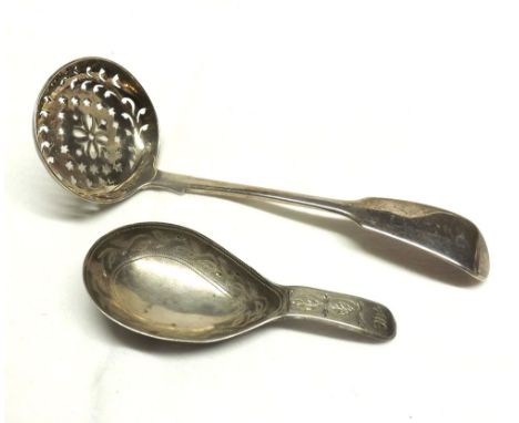 A Mixed Lot comprising: a George III Silver Caddy Spoon with bright cut decoration, hallmarked Birmingham 1802, Maker Samuel 