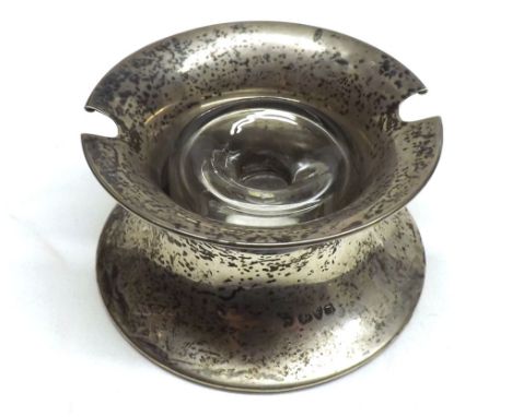 A late Victorian Silver Inkwell of round form with central clear glass bottle, 2 high, Chester 1900&nbsp;
Condition:
Structur