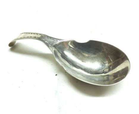 A George III Silver Caddy Spoon, the Old English handle with bright cut decoration to a deep pear-shaped bowl, (repair to han