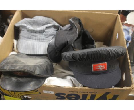 A BOX OF RAILWAY UNIFORM TO INCLUDE CAPS, SCARF ETC