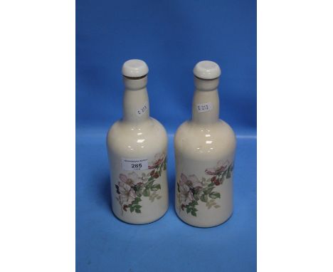 A PAIR OF PORTMEIRION CERAMIC BOTTLES