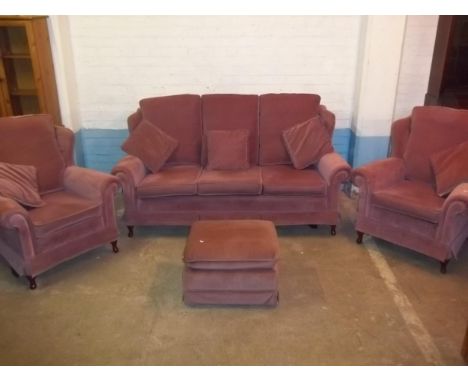 A THREE PIECE QUEEN ANNE WING BACKED SUITE COMPRISING THREE SEATER SOFA AND TWO CHAIRS, SPRUNG EDGE, COIL SPRUNG WITH BEECH F