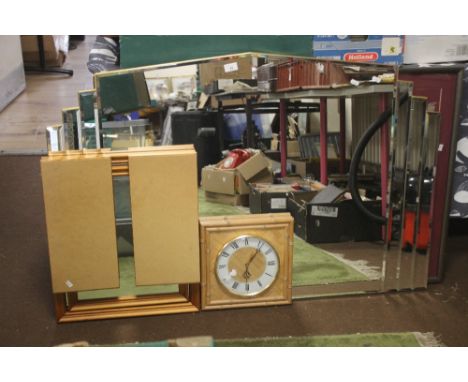 A LARGE MIRROR 122 CM X 82 CM TOGETHER WITH A DRESSING TABLE MIRROR AND A CLOCK.