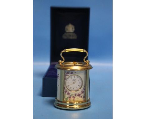 A HALCYON DAYS ENAMEL CLOCK