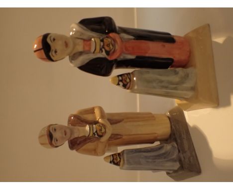 Two Clarice Cliff figurines, H: 17 cm 