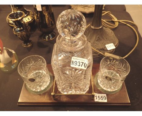Decanter with two whisky glasses by Derwent crystal on a wooden display