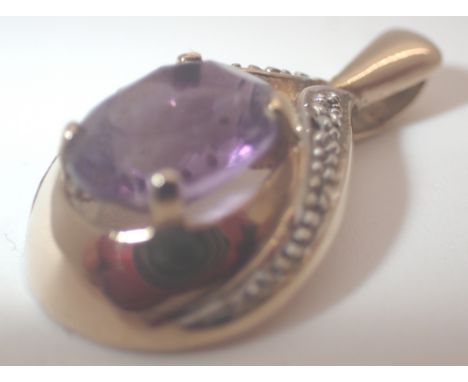 9ct gold amethyst and diamond pendant