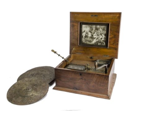 Disc musical box: Polyphon, 11 in, with single comb, in walnut case with monochrome print and inlaid panel (lacking stop/star