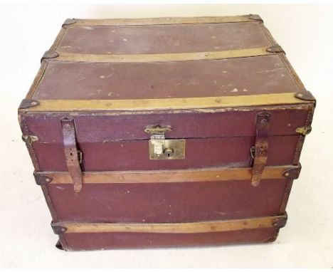 A 19th century leather trunk with original webbed cage interior