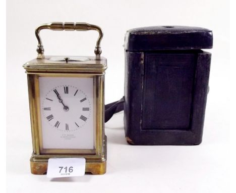 A late 19th century carriage clock by J W Benson with striking and repeating movement in original case with key 