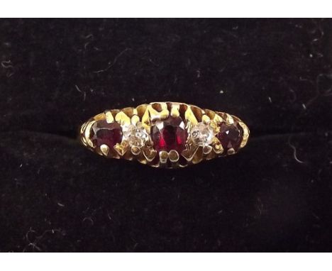 A 15ct gold diamond and ruby ring 