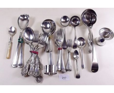 A group of silver plated cutlery including ladle, etc.