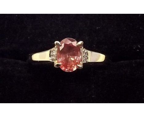 A 9ct gold padparadscha sapphire ring