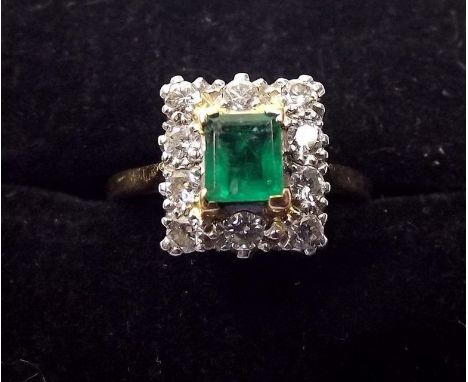 An 18ct gold and platinum emerald and diamond Art Deco style ring 