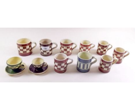 Nine Chequer Ware pottery mugs and two cups and saucers 