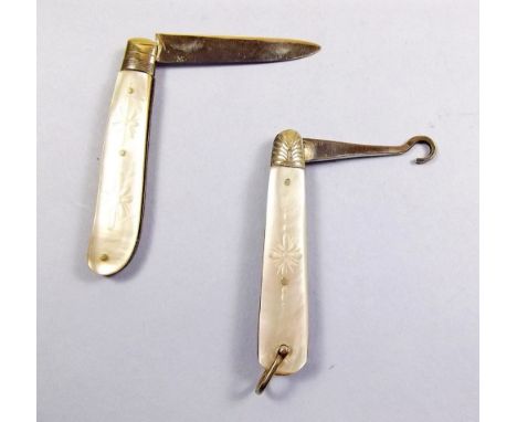 A small mother of pearl and silver folding fruit knife Birmingham 1877 and a mother of pearl and silver button hook Sheffield