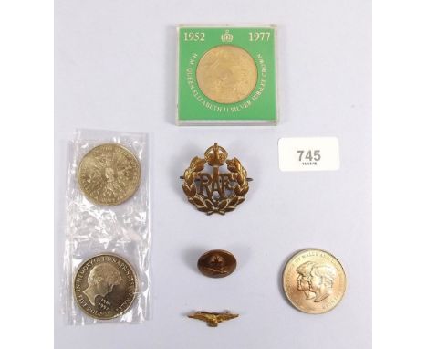 An RAF cap badge, button and RAF small brooch together with  four commemorative crowns