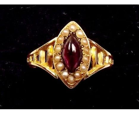 A Victorian 15ct gold cabochon cut mauve stone and seed pearl ring 