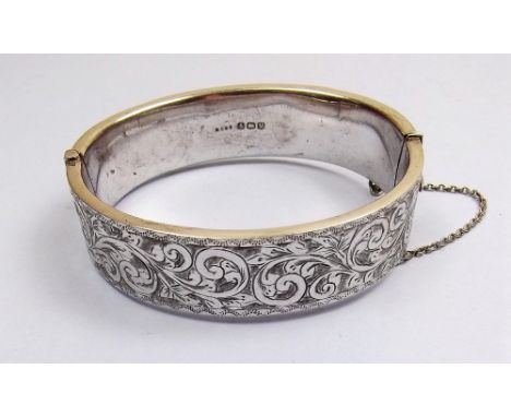 A silver engraved bangle 