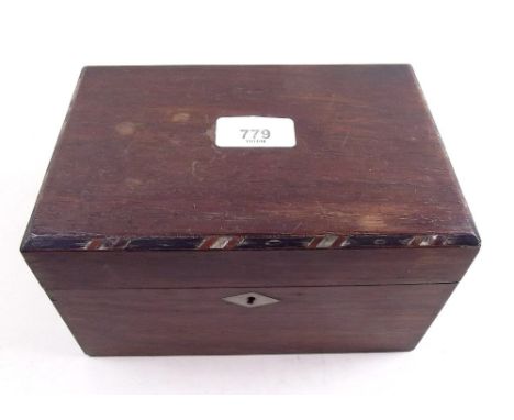 A Victorian mahogany tea caddy with mother of pearl inlay 