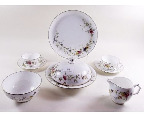 A Grainger & Co. Worcester tea service comprising: six cups and saucers, six tea plates, milk, sugar, cake plates and muffin 