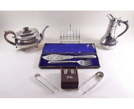 A Victorian silver plated fish knife and fork, a toast rack, sugar tongs, coffee pot and teapot 