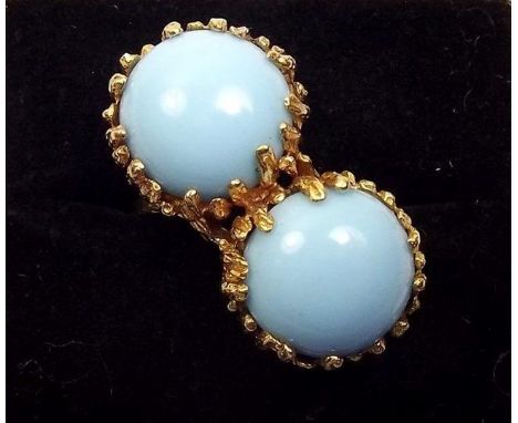 An 18ct gold ring set two 'Imperial' turquoise stones 