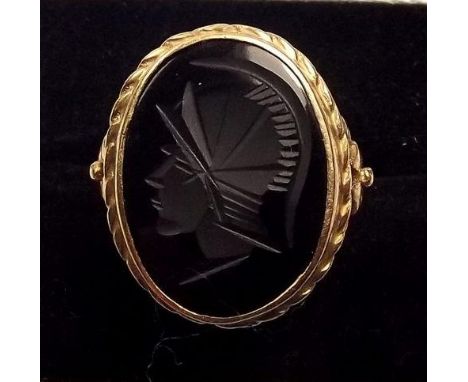 A 9ct gold ring set black onyx intaglio 