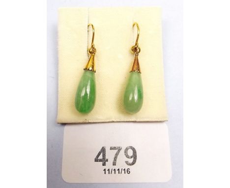 A pair of jade tear drop earrings with 9ct mounts 