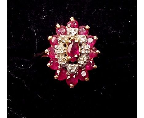 A 9ct gold ruby and chip diamond cluster ring 