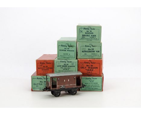 Hornby O Gauge No 50 Freight Stock: nine boxed examples including Brake Van, Cattle, Refrigerator, Goods Van, Saxa, Hopper, L