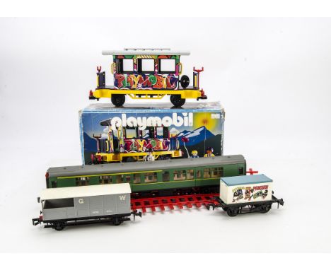 Plastic-era' O Gauge Rolling Stock and Track by various makers: including two green BR Mk 1 coaches and two wagons by Lima, s