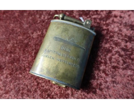 German brass lighter engraved with figure of U-boat U162 Capitanleutnant Jurgen Wattenberg (10cm high) 