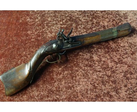 19th C flintlock knee Blunderbuss pistol with 11 1/2 inch flared muzzle barrel, cavalry style slide ring, with traces of engr