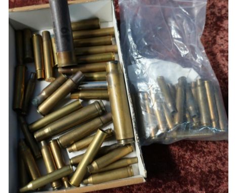 Selection of various casings including 7x64, a cut away section of a engine starting cartridge, K43s, 20MM etc 