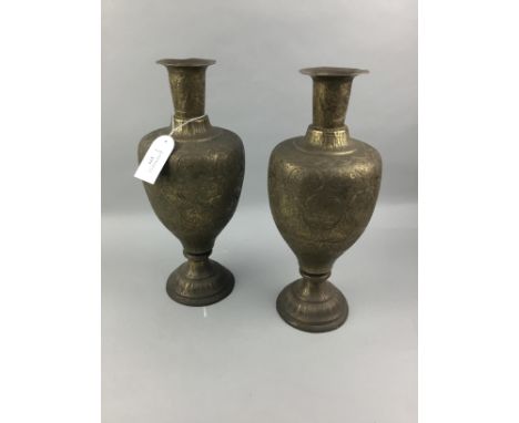 PAIR OF INDO-PERSIAN BRASS VASES, 36cm high, along with two brass chargers, and a ceramic serving bowl
