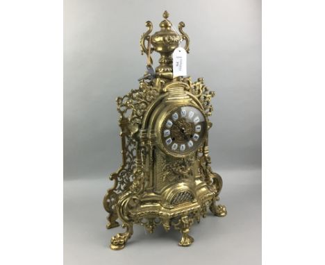 RICHLY CAST BRASS MANTEL CLOCK, in the Victorian manner, 58cm high