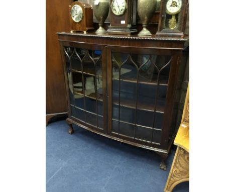 MAHOGANY BOW FRONTED TWO DOOR BOOKCASE, 122cm wide