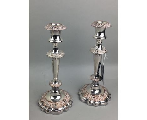 PAIR OF SILVER PLATED CANDLESTICKS, along with a cigarette box, two silver photograph frames, tea pot, entree dishes, hotel w