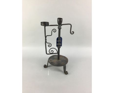 LATE 19TH CENTURY AESTHETIC IRON CANDLESTICK, 32cm high