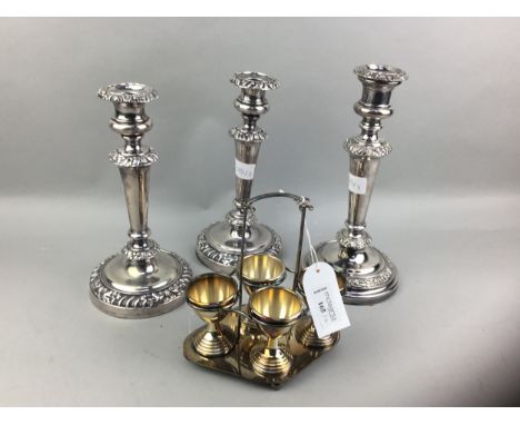 PAIR OF SILVER PLATED CANDLESTICKS, 24cm high, along with a similar larger candlestick and other plated ware including entrée