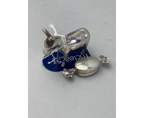 SILVER PILL BOX MODELLED AS A WRAPPED SWEETIE, along with a model of a donkey marked Peru Silver, the donkey 94g (2)