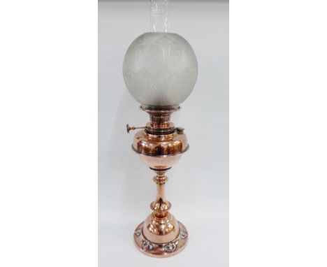 Art Nouveau copper oil lamp with etched glass globular shade