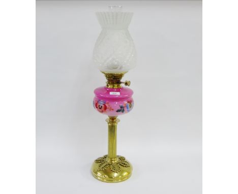 Hinks brass oil lamp with pink opaque glass well, painted with enamel flowers with a moulded glass shade 