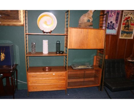 20th Century Staples ladderax teak shelving unit comprising of six teak shelves, two sliding door cupboard sections, three dr